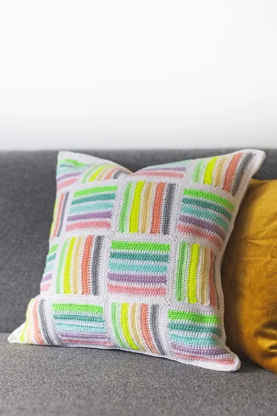 Luminous Loom Pillow